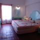 Guest room at Marina Hotel and Resort in Huatulco Cama
