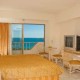 Guest room at the Tesoro hotel in Ixtapa room_OV