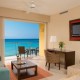 Sala de una de las suites en el Now Jade Riviera Cancun NOWRC_JRSuite2_4