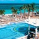 Swimming pool with pool bar and Jacuzzi at the Riu Palace Cabo San Lucas pool bar