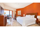 Img - Habitación tradicional con vista parcial al mar