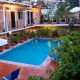 View of the pool of Posada de Roger hotel Posada de Roger alberca