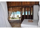 Img - Cabaña con baño privado frente al mar