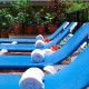 Solarium and sun loungers at Hotel Posada de Roger solarium camastros Posada de Roger